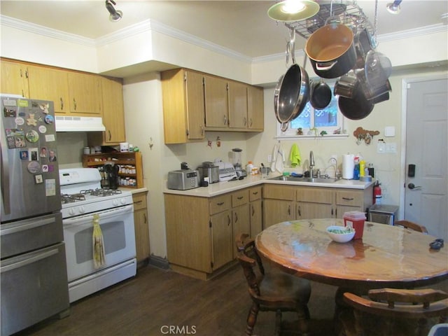 kitchen with stainless steel fridge, white gas range oven, ornamental molding, and dark wood-type flooring