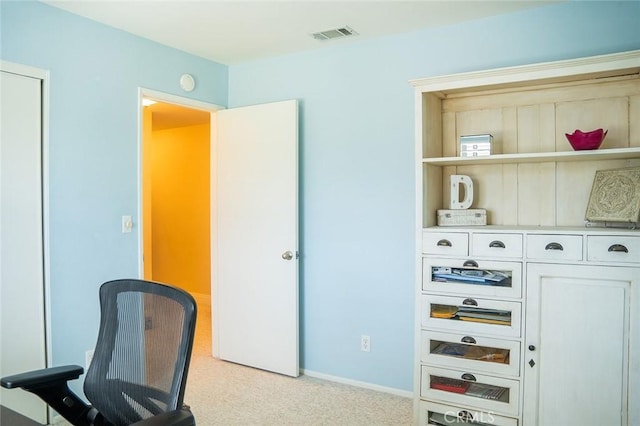 view of carpeted office space