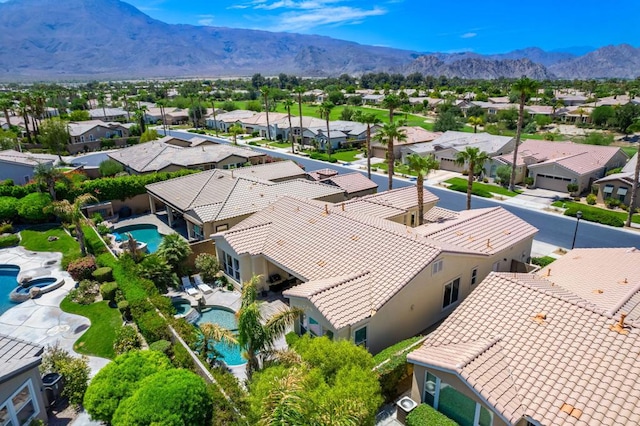 bird's eye view with a mountain view