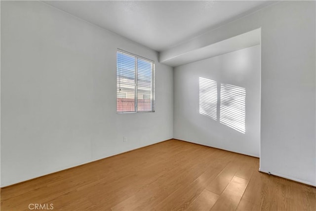 empty room with light wood-type flooring