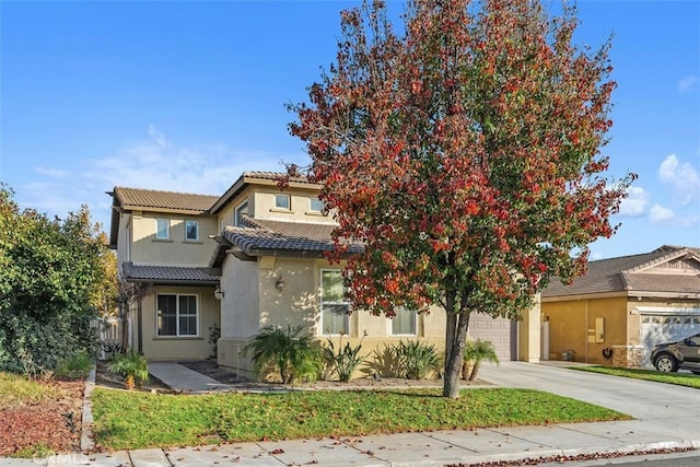 view of front of home with a garage