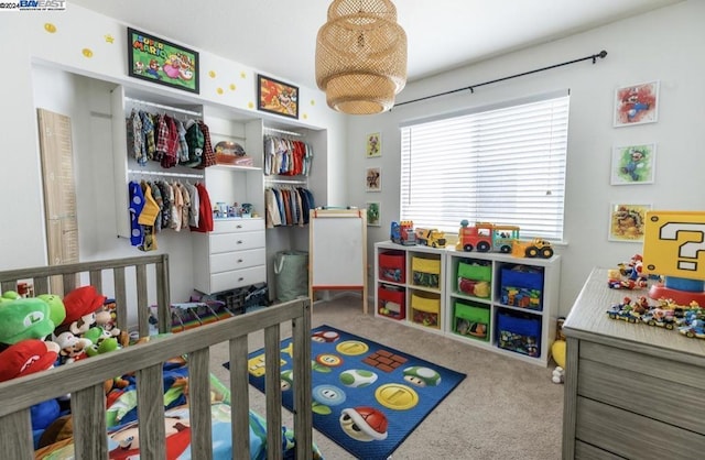 carpeted bedroom with a closet