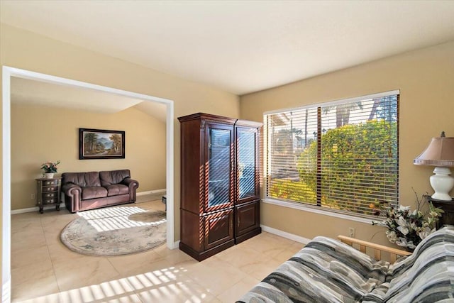 living room featuring light tile patterned flooring