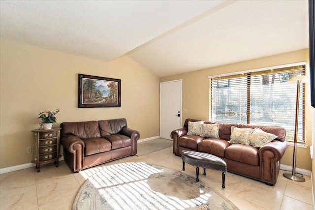 living room with light tile patterned floors and vaulted ceiling