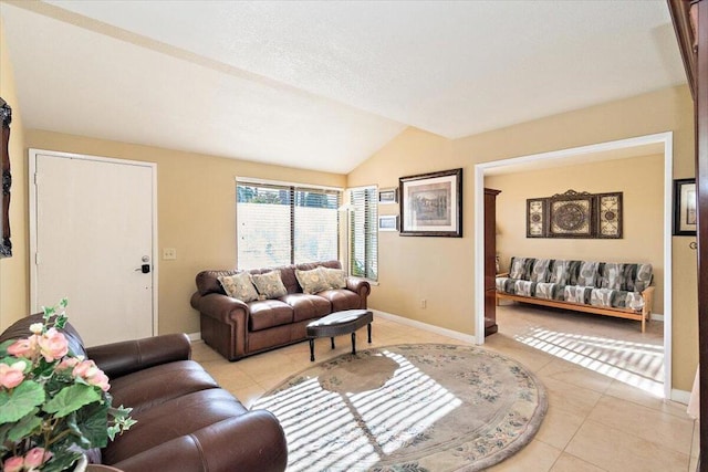 tiled living room with vaulted ceiling