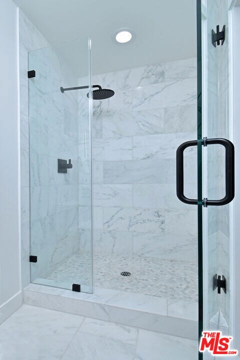 bathroom featuring walk in shower