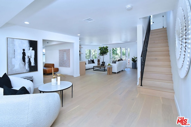 living room with wood-type flooring