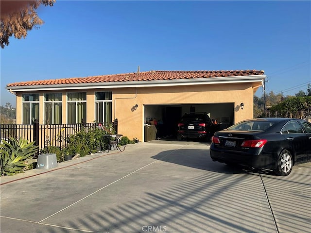 view of property exterior with a garage