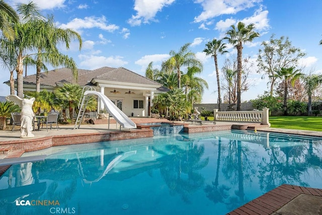 9120 Laramie Ave, Bakersfield, CA 93314 - view of pool featuring a jacuzzi, a water slide, a patio, and ceiling fan