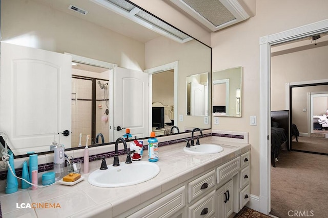 9120 Laramie Ave, Bakersfield, CA 93314 - bathroom with vanity and tiled shower