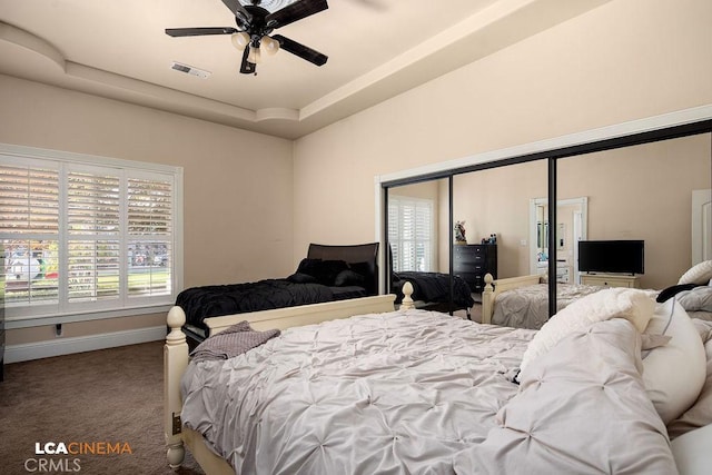 9120 Laramie Ave, Bakersfield, CA 93314 - carpeted bedroom featuring a closet, ceiling fan, and a tray ceiling