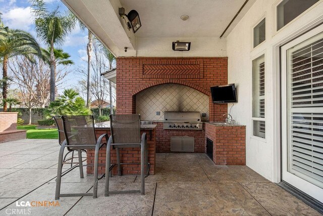 9120 Laramie Ave, Bakersfield, CA 93314 - view of patio with area for grilling, sink, and grilling area