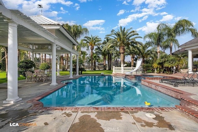 9120 Laramie Ave, Bakersfield, CA 93314 - view of pool with a patio, an in ground hot tub, and a water slide