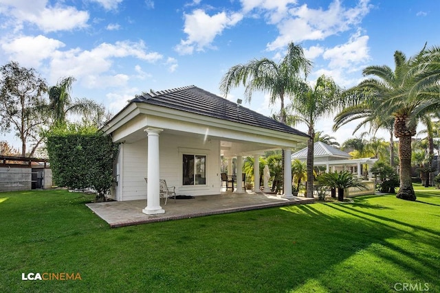 9120 Laramie Ave, Bakersfield, CA 93314 - rear view of house with a patio area and a lawn