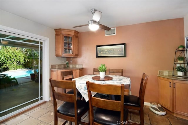 dining area featuring ceiling fan