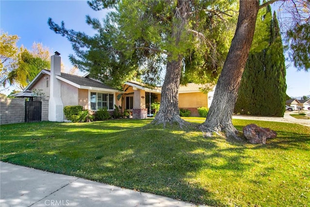 view of front of home with a front lawn