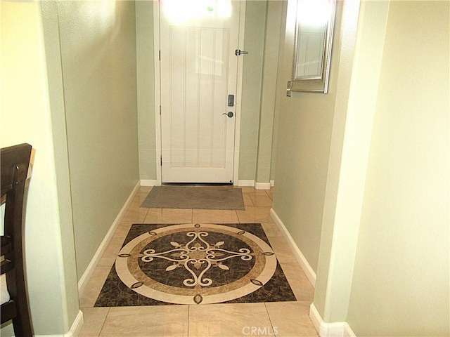 entryway featuring light tile patterned floors