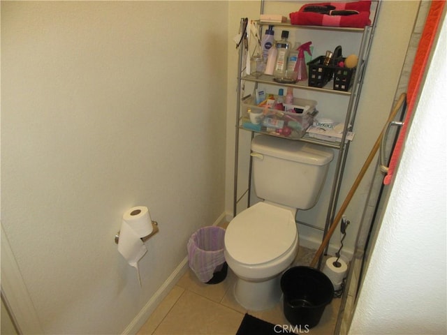 bathroom with tile patterned floors and toilet