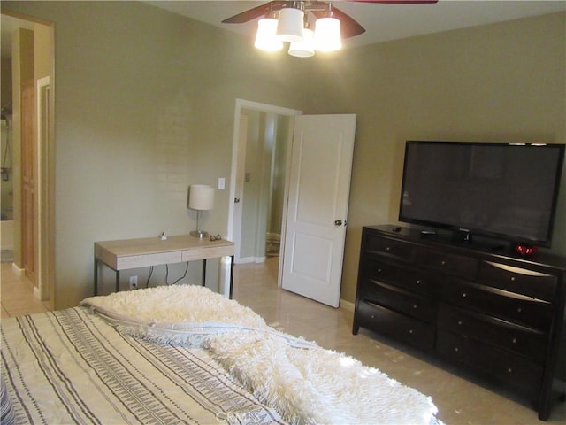 tiled bedroom with ceiling fan