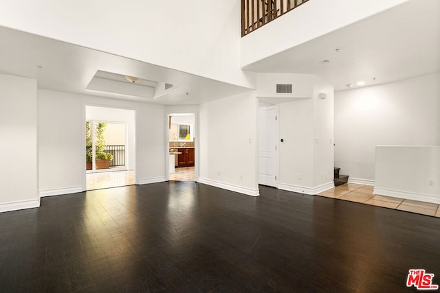 unfurnished living room with light wood-type flooring