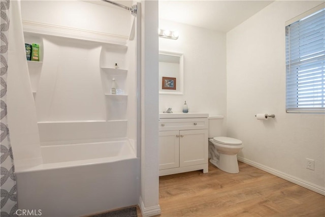 full bathroom with wood-type flooring, vanity, toilet, and shower / bath combination with curtain