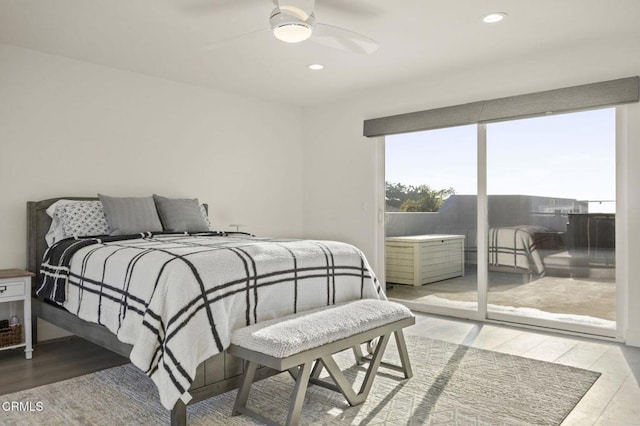 bedroom with hardwood / wood-style flooring and ceiling fan