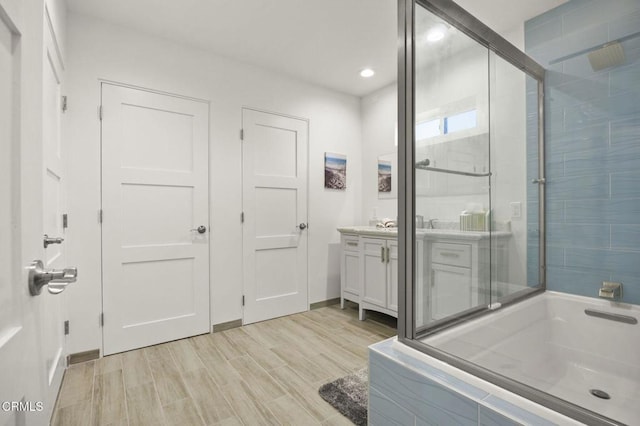 bathroom featuring vanity and wood-type flooring