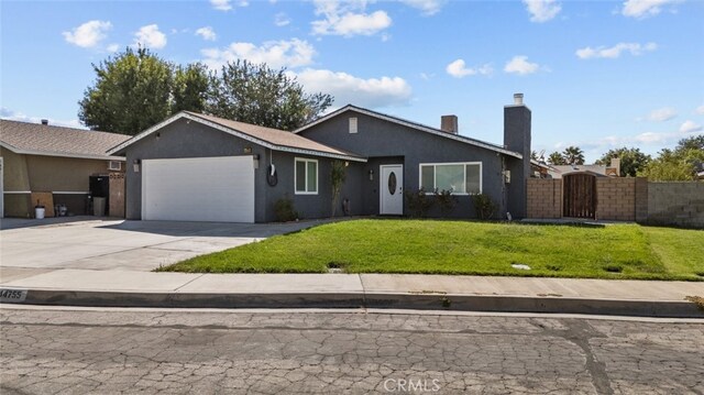 ranch-style house with a garage and a front yard