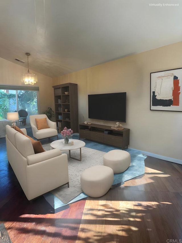 living room with dark hardwood / wood-style floors, vaulted ceiling, and a notable chandelier