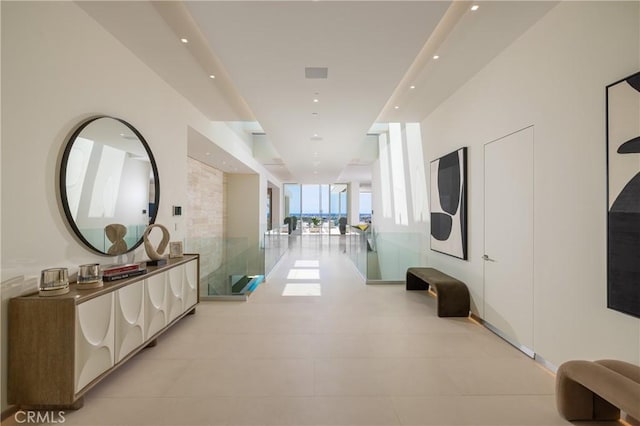 hallway featuring light tile patterned floors