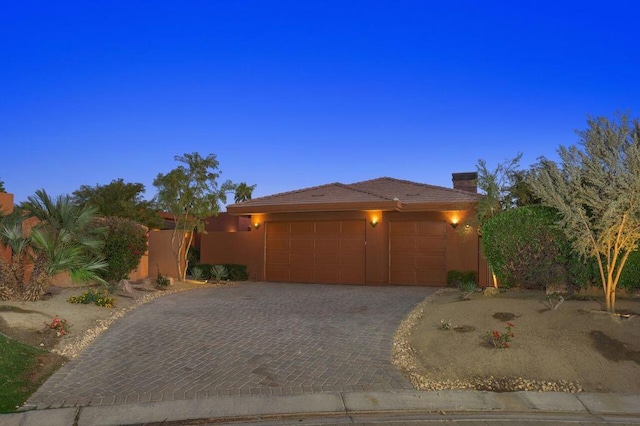 view of front of home featuring a garage