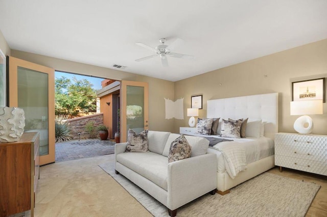 carpeted bedroom featuring access to exterior and ceiling fan