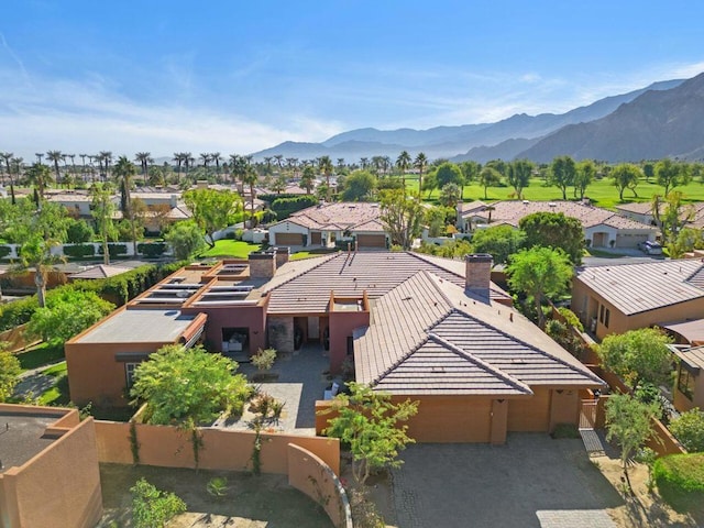 drone / aerial view featuring a mountain view