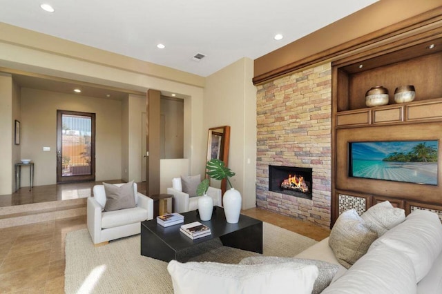 living room featuring a fireplace