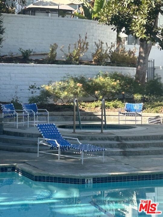 view of pool with a patio