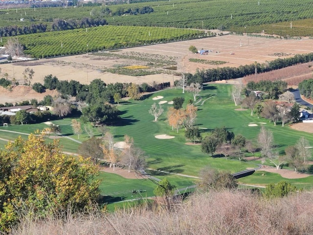 birds eye view of property with a rural view