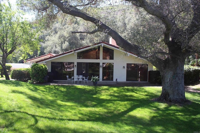 32202 Taupa Way, Pauma Valley, CA 92061 - rear view of property with a lawn and stucco siding