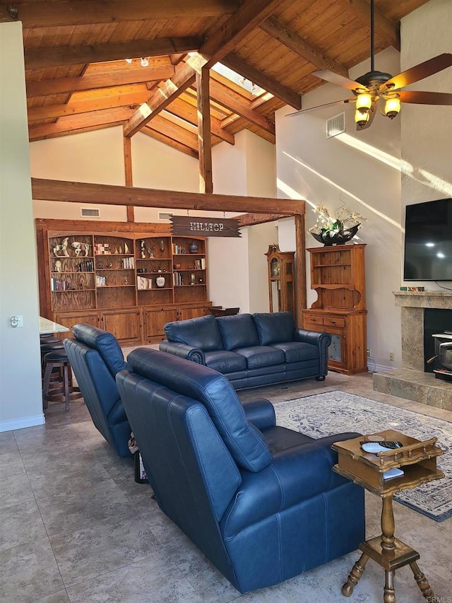 32202 Taupa Way, Pauma Valley, CA 92061 - living area with wooden ceiling with exposed beams, ceiling fan, baseboards, high vaulted ceiling, and a high end fireplace