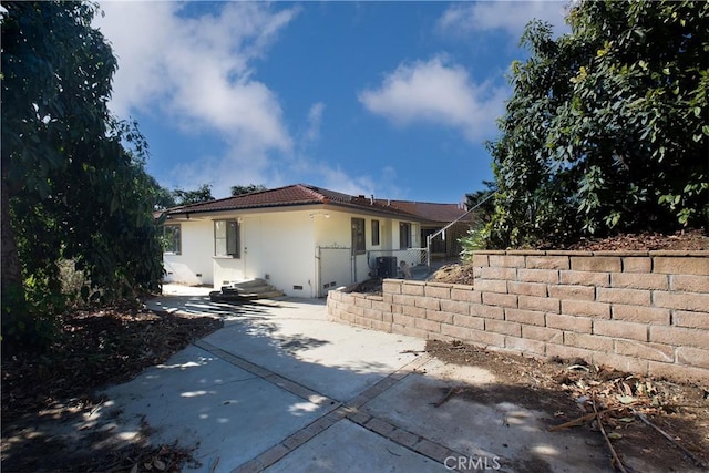 exterior space with a patio