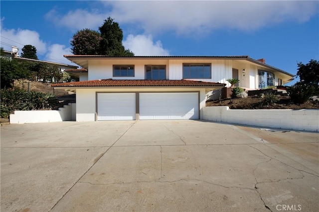 view of front of home with a garage