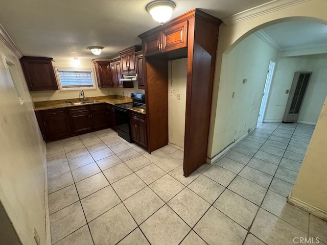 kitchen featuring ornamental molding, dark brown cabinetry, sink, light tile patterned floors, and black electric range