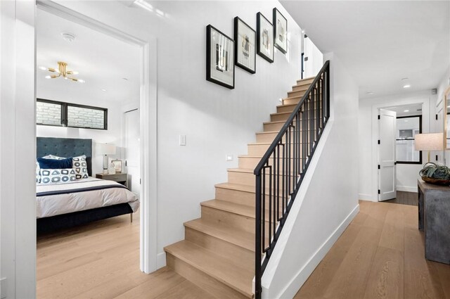 stairway with wood-type flooring