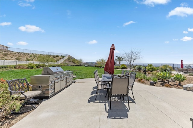 7631 Capstone Ct, Riverside, CA 92506 - view of patio / terrace featuring an outdoor kitchen and outdoor dining area