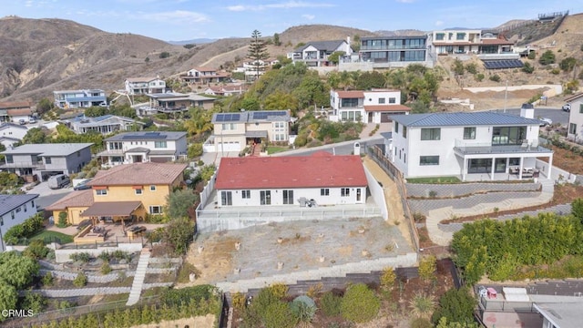 aerial view featuring a residential view and a mountain view