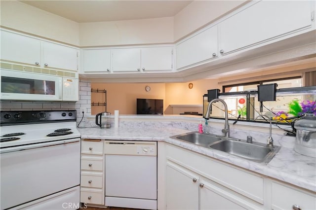 10655 Lemon Ave Unit 2709, Rancho Cucamonga, CA 91737 - kitchen featuring white appliances, a sink, white cabinets, and backsplash