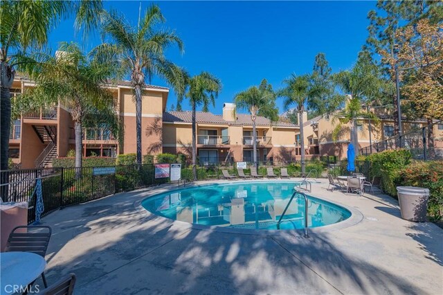 view of swimming pool featuring a patio
