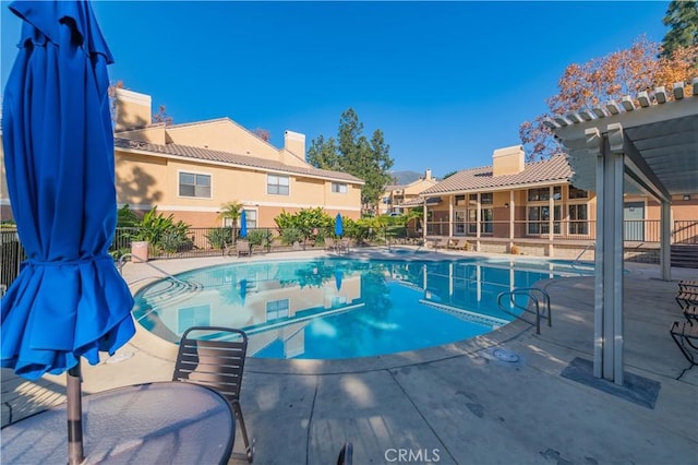 10655 Lemon Ave Unit 2709, Rancho Cucamonga, CA 91737 - community pool with a patio and fence