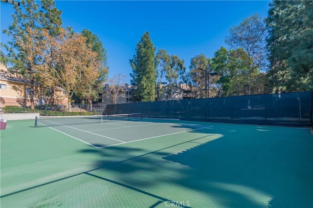 10655 Lemon Ave Unit 2709, Rancho Cucamonga, CA 91737 - view of tennis court with community basketball court and fence