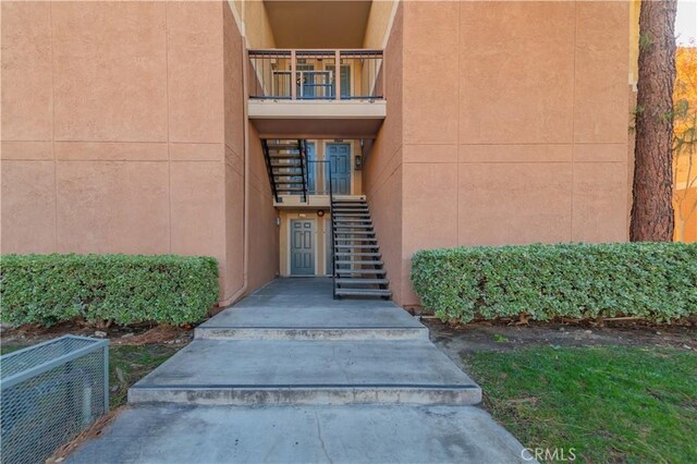 10655 Lemon Ave Unit 2709, Rancho Cucamonga, CA 91737 - view of exterior entry with stucco siding