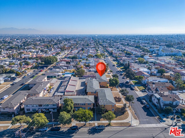 drone / aerial view featuring a mountain view